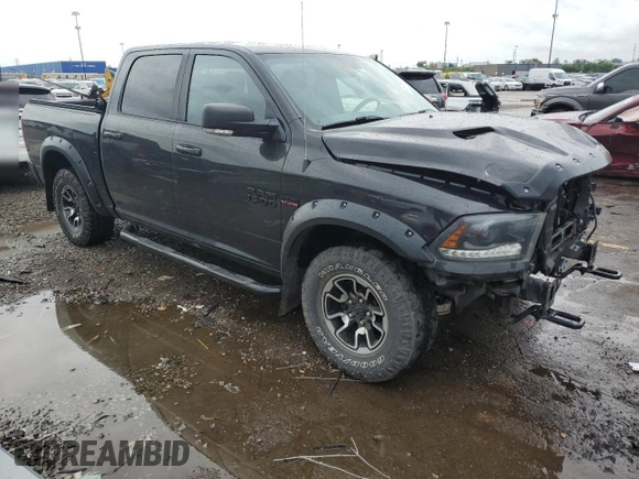 2015 Ram 1500 Rebel with VIN 1C6RR7YT8FS743062, listed as a Copart auction lot 61678185 with 130,997 mi miles and Clean title. Bid and sale history available at DreamBid. Image 4.