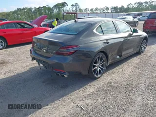 2023 Genesis G70 2.0T with VIN KMTG34TA4PU126965, listed as a IAAI auction lot 41971103 with 27,304 mi miles. Bid and sale history available at carsss.com. Image 4.