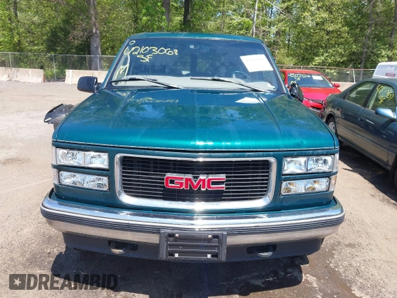 1997 GMC Suburban with VIN 3GKFK16R5VG508908, listed as a IAAI auction lot 42103068 with 264,446 mi miles and . Bid and sale history available at DreamBid. Image 13.