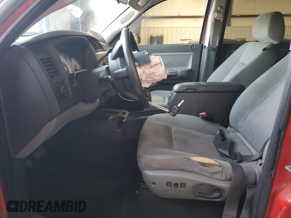 2008 Dodge Dakota SLT with VIN 1D7HE48K38S581338, listed as a Copart auction lot 85081194 with 217,780 mi miles and Salvage Title. Bid and sale history available at DreamBid. Image 7.