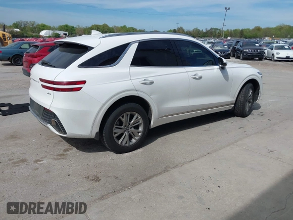 2022 Genesis GV70 2.5T with VIN KMUMADTB0NU043317, listed as a IAAI auction lot 42222034 with 30,566 mi miles and . Bid and sale history available at DreamBid. Image 4.