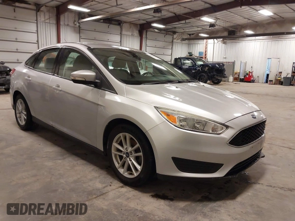 2017 Ford Focus SE z VIN 1FADP3F20HL245291, wystawiony jako IAAI lot #42194880 z przebiegiem 93 764 mil mil oraz . Historia ofert i sprzedaży dostępna na DreamBid. Obrazek 1.