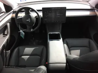 2024 Tesla Model Y with VIN 7SAYGDEDXRA322676, listed as a Copart auction lot 55664125 with 8,788 mi miles and Clean title. Bid and sale history available at DreamBid. Image 8.