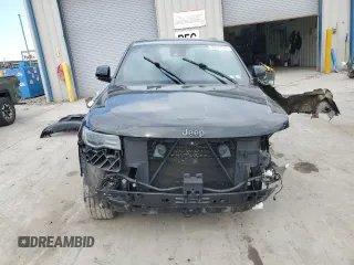 2021 Jeep Grand Cherokee Overland with VIN 1C4RJFCG3MC527325, listed as a Copart auction lot 50040765 with 64,338 mi miles and Salvage Title. Bid and sale history available at carsss.com. Image 5.