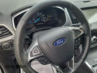 2020 Ford Edge Titanium with VIN 2FMPK3K99LBA73839, listed as a IAAI auction lot 42843885 with 92,381 mi miles and . Bid and sale history available at DreamBid. Image 34.