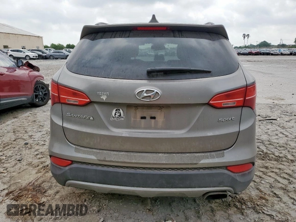 2013 Hyundai Santa Fe Sport z VIN 5XYZU3LB9DG014666, wystawiony jako Copart lot #57304515 z przebiegiem 148 369 mil mil oraz Szkoda całkowita • Salvage title. Historia ofert i sprzedaży dostępna na DreamBid. Obrazek 6.