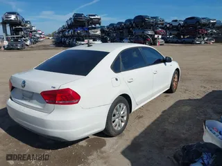 2015 Volkswagen Passat 1.8T Limited Edition with VIN 1VWAT7A38FC043258, listed as a IAAI auction lot 41433514 with 111,169 mi miles. Bid and sale history available at carsss.com. Image 4.