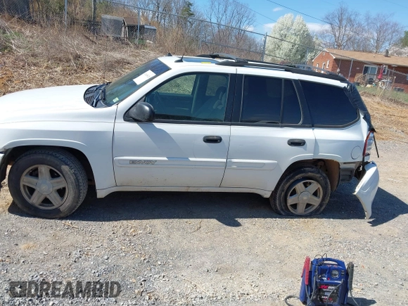 2004 GMC Envoy SLE with VIN 1GKDT13S442223832, listed as a IAAI auction lot 41845628 with 265,898 mi miles. Bid and sale history available at carsss.com. Image 15.