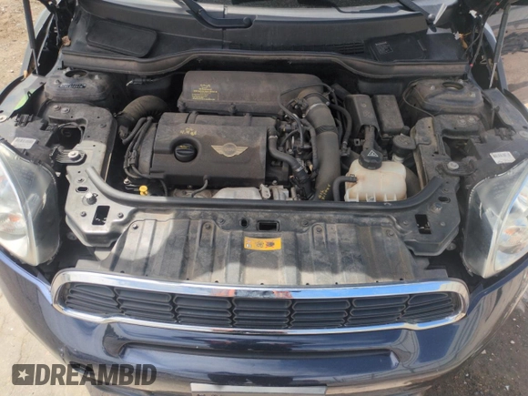 2012 MINI Countryman S with VIN WMWZC3C57CWL87894, listed as a Copart auction lot 56683985 with 54,032 mi miles and Salvage title. Bid and sale history available at DreamBid. Image 11.