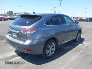 2014 Lexus RX 450h with VIN JTJZB1BA0E2413526, listed as a IAAI auction lot 42262130 with Not provided miles and . Bid and sale history available at DreamBid. Image 4.