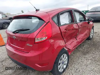 2011 Ford Fiesta SE with VIN 3FADP4EJ9BM216456, listed as a IAAI auction lot 41918530 with 165,989 mi miles. Bid and sale history available at carsss.com. Image 17.