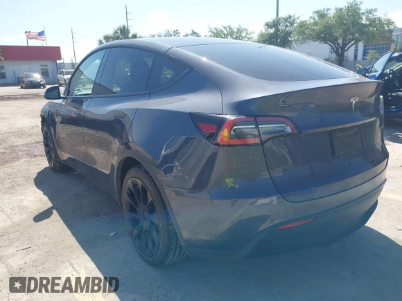 2021 Tesla Model Y Long Range with VIN 5YJYGDEE4MF076791, listed as a IAAI auction lot 41945750 with Not Provided miles and . Bid and sale history available at DreamBid. Image 3.