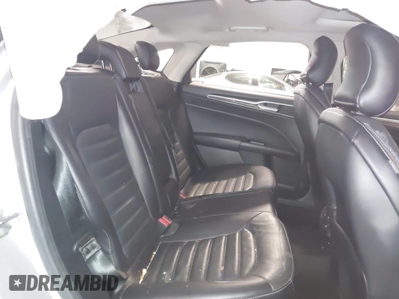 2017 Ford Fusion SE z VIN 3FA6P0H95HR203170, wystawiony jako IAAI lot #41569303 z przebiegiem 143 287 mil mil oraz . Historia ofert i sprzedaży dostępna na DreamBid. Obrazek 8.