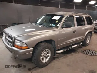 2000 Dodge Durango with VIN 1B4HS28N0YF279416, listed as a IAAI auction lot 41767387 with 157,649 mi miles and . Bid and sale history available at DreamBid. Image 2.
