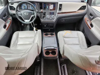 2015 Toyota Sienna XLE with VIN 5TDYK3DC4FS617099, listed as a Copart auction lot 61128025 with 114,508 mi miles and Salvage title. Bid and sale history available at DreamBid. Image 8.