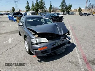 1999 Nissan Maxima GXE z VIN JN1CA21D9XM409448, wystawiony jako Copart lot #51822895 z przebiegiem Nie podano mil oraz Szkoda całkowita • Salvage title. Historia ofert i sprzedaży dostępna na DreamBid. Obrazek 10.