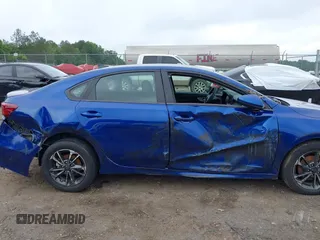 2024 Kia Forte LXS with VIN 3KPF24AD4RE708740, listed as a IAAI auction lot 42153113 with 35,054 mi miles and . Bid and sale history available at DreamBid. Image 6.
