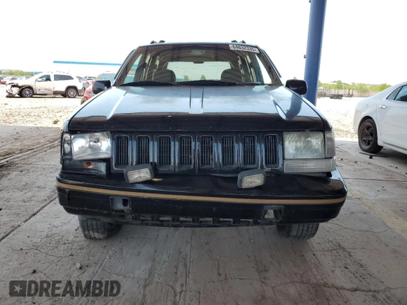 1994 Jeep Grand Cherokee Limited with VIN 1J4GZ78S5RC304501, listed as a Copart auction lot 64632335 with 184,333 mi miles and Salvage title. Bid and sale history available at DreamBid. Image 5.