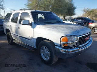 2005 GMC Yukon SLE z VIN 1GKEC13TX5J145688, wystawiony jako IAAI lot #40699601 z przebiegiem Nie podano mil oraz . Historia ofert i sprzedaży dostępna na DreamBid. Obrazek 1.
