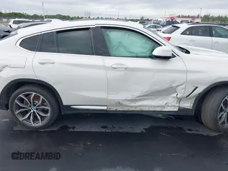 2020 BMW X4 xDrive30i z VIN 5UX2V1C02LLE68148, wystawiony jako IAAI lot #42253362 z przebiegiem 80 865 mil mil oraz . Historia ofert i sprzedaży dostępna na DreamBid. Obrazek 6.