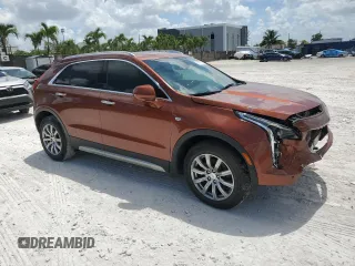 2019 Cadillac XT4 FWD Premium Luxury with VIN 1GYFZCR41KF183507, listed as a Copart auction lot 61581215 with 64,803 mi miles and Salvage title. Bid and sale history available at DreamBid. Image 4.
