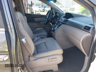 2011 Honda Odyssey EX-L with VIN 5FNRL5H64BB070836, listed as a IAAI auction lot 42520878 with 162,316 mi miles and . Bid and sale history available at DreamBid. Image 5.