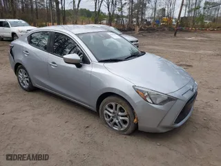 2018 Toyota Yaris iA with VIN 3MYDLBYV6JY318637, listed as a IAAI auction lot 41503146 with 87,247 mi miles. Bid and sale history available at carsss.com. Image 1.