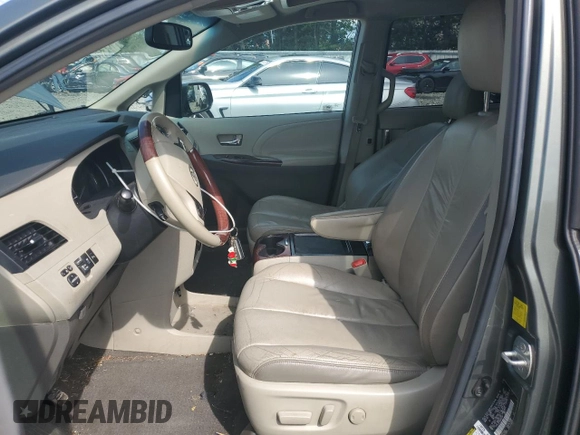 2011 Toyota Sienna XLE AAS with VIN 5TDYK3DC5BS094699, listed as a Copart auction lot 61583905 with 245,035 mi miles and Salvage title. Bid and sale history available at DreamBid. Image 7.