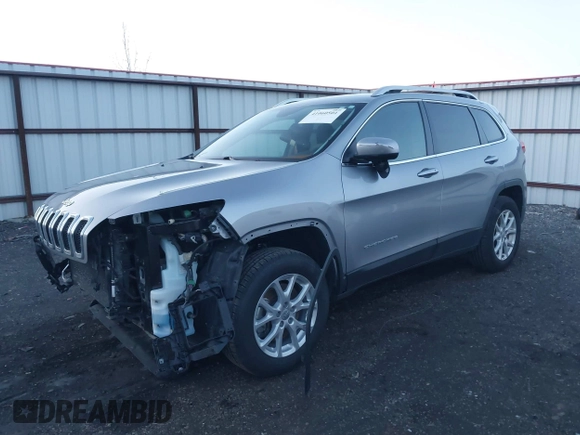 2014 Jeep Cherokee Latitude with VIN 1C4PJMCSXEW220556, listed as a IAAI auction lot 41060501 with 70,152 mi miles and . Bid and sale history available at carsss.com. Image 17.