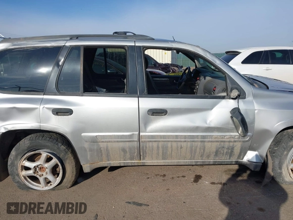 2004 GMC Envoy SLT with VIN 1GKDT13S742133932, listed as a IAAI auction lot 41598339 with 168,651 mi miles and . Bid and sale history available at DreamBid. Image 13.