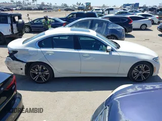 2020 BMW 3 Series 330i z VIN 3MW5R1J01L8B05556, wystawiony jako IAAI lot #42299891 z przebiegiem 61 404 mil mil oraz . Historia ofert i sprzedaży dostępna na DreamBid. Obrazek 13.