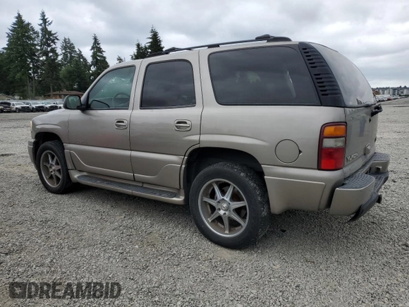 2002 GMC Yukon Denali z VIN 1GKEK63U82J224913, wystawiony jako Copart lot #60664885 z przebiegiem 208 794 mil mil oraz Szkoda całkowita • Salvage title. Historia ofert i sprzedaży dostępna na DreamBid. Obrazek 2.