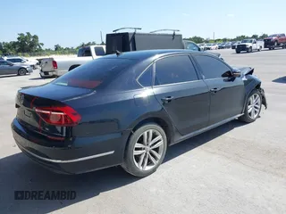 2019 Volkswagen Passat 2.0T Wolfsburg Edition with VIN 1VWLA7A30KC009646, listed as a IAAI auction lot 39842320 with 101,006 mi miles. Bid and sale history available at carsss.com. Image 4.