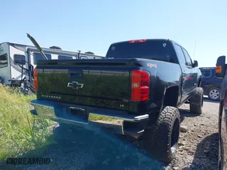 2016 Chevrolet Silverado 1500 LT with VIN 3GCUKREC3GG231290, listed as a IAAI auction lot 40113464 with 160,109 mi miles. Bid and sale history available at carsss.com. Image 4.
