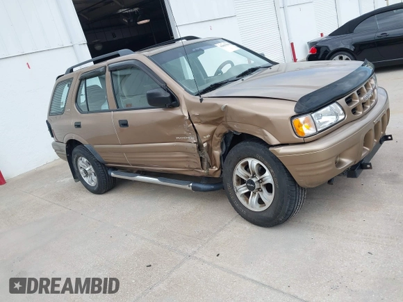 2000 Isuzu Rodeo S with VIN 4S2CK58W3Y4316966, listed as a IAAI auction lot 42003598 with 106,187 mi miles and . Bid and sale history available at carsss.com. Image 13.