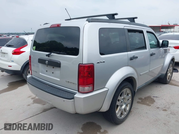 2010 Dodge Nitro SE z VIN 1D4PU2GK4AW146358, wystawiony jako IAAI lot #42299592 z przebiegiem 153 774 mil mil oraz . Historia ofert i sprzedaży dostępna na DreamBid. Obrazek 4.