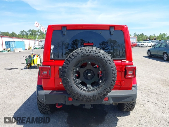 2020 Jeep Wrangler Unlimited Rubicon with VIN 1C4HJXFG9LW106607, listed as a IAAI auction lot 41908295 with 71,083 mi miles and . Bid and sale history available at DreamBid. Image 16.
