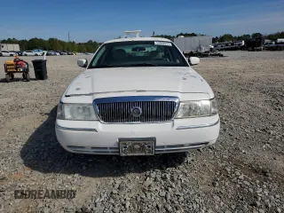 2004 Mercury Grand Marquis GS z VIN 2MEFM74WX4X640485, wystawiony jako Copart lot #50902855 z przebiegiem 104 350 mil mil oraz Szkoda całkowita • Salvage title. Historia ofert i sprzedaży dostępna na DreamBid. Obrazek 5.