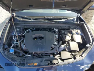 2023 Mazda CX-30 S Premium with VIN 3MVDMBDM7PM543849, listed as a Copart auction lot 54852415 with 20,898 mi miles and Salvage title. Bid and sale history available at DreamBid. Image 12.
