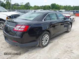 2014 Ford Taurus SE z VIN 1FAHP2D81EG140072, wystawiony jako IAAI lot #42124900 z przebiegiem 116 560 mil mil oraz . Historia ofert i sprzedaży dostępna na DreamBid. Obrazek 4.