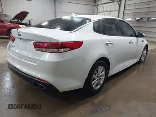 2016 Kia Optima LX with VIN 5XXGT4L39GG048740, listed as a IAAI auction lot 42103300 with 111,574 mi miles and . Bid and sale history available at DreamBid. Image 4.