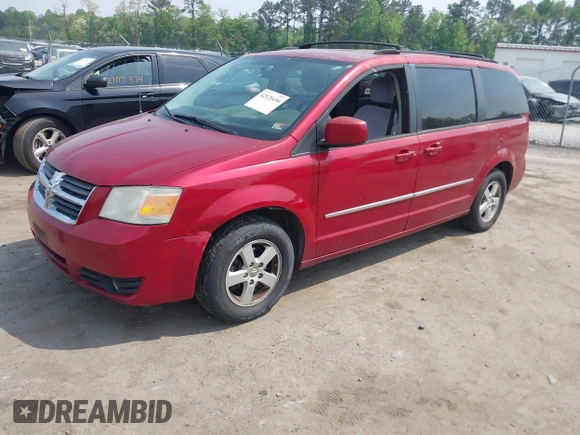 2010 Dodge Grand Caravan SXT with VIN 2D4RN5D17AR145958, listed as a IAAI auction lot 42125450 with 229,790 mi miles and . Bid and sale history available at DreamBid. Image 2.