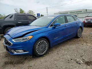 2017 Ford Fusion Hybrid Titanium with VIN 3FA6P0RU1HR138725, listed as a Copart auction lot 56650625 with 77,331 mi miles and Salvage title. Bid and sale history available at DreamBid. Image 1.