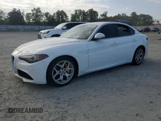 2018 Alfa Romeo Giulia Ti Sport z VIN ZARFAECN4J7579892, wystawiony jako Copart lot #61759515 z przebiegiem 116 228 mil mil oraz Czysty tytuł • Clean title. Historia ofert i sprzedaży dostępna na DreamBid. Obrazek 1.