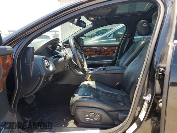 2011 Jaguar XJ with VIN SAJWA1CBXBLV12152, listed as a Copart auction lot 62010855 with 125,697 mi miles and Salvage title. Bid and sale history available at DreamBid. Image 7.