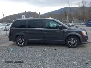 2014 Dodge Grand Caravan SXT with VIN 2C4RDGCG6ER376714, listed as a IAAI auction lot 41828025 with 172,285 mi miles and . Bid and sale history available at DreamBid. Image 13.