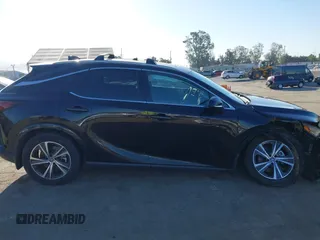 2023 Lexus RX 350 with VIN 2T2BAMBAXPC005107, listed as a IAAI auction lot 42287535 with 51,672 mi miles and . Bid and sale history available at DreamBid. Image 12.