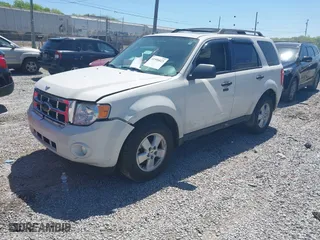 2010 Ford Escape XLT with VIN 1FMCU0D74AKC67975, listed as a IAAI auction lot 41996023 with 199,626 mi miles. Bid and sale history available at carsss.com. Image 2.