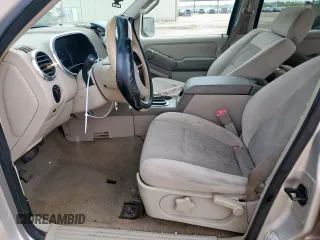 2006 Ford Explorer XLS with VIN 1FMEU62E56ZA18340, listed as a Copart auction lot 59800835 with 200,149 mi miles and Salvage title. Bid and sale history available at DreamBid. Image 7.