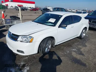 2014 Dodge Avenger SE z VIN 1C3CDZAB1EN116800, wystawiony jako IAAI lot #41668822 z przebiegiem 190 583 mil mil oraz . Historia ofert i sprzedaży dostępna na DreamBid. Obrazek 2.